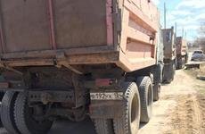 В Волжском полиция заинтересовалась КАМАЗами, вывозившими мусор на территорию рядом с СНТ